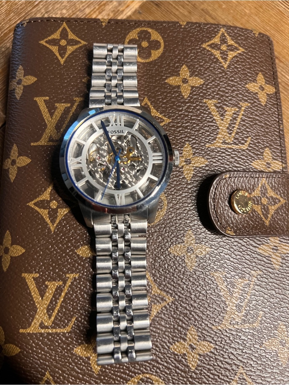 Fossil Men’s Silver Skeleton Watch with Blue Hands